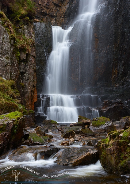 slides/Unknown Falls 3, Sutherland.jpg sutherland,scotland,highlands,rain,waterfall,red rocks Unknown Falls 3, Sutherland